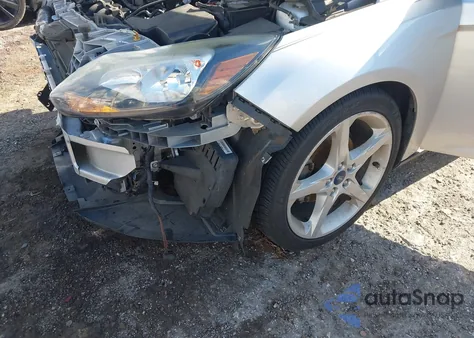 2014 Ford Focus Titanium z USA, uszkodzony, nr VIN 1FADP3J27EL463120